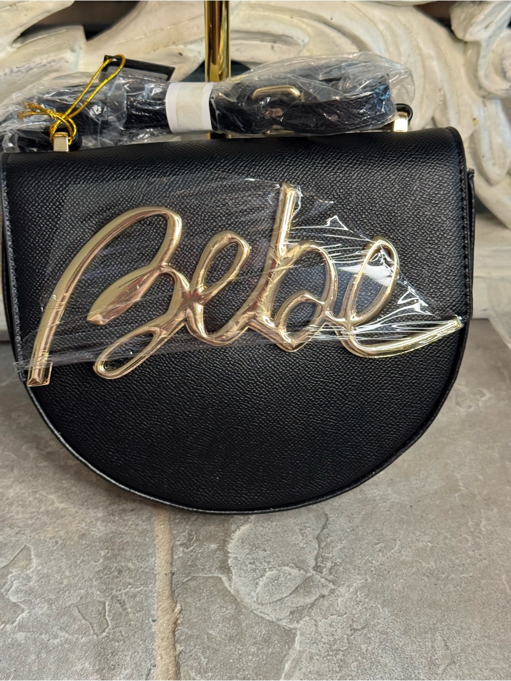 Bebe Gabriel Black Crossbody Saddle Bag with Gold Script Accent NWT
